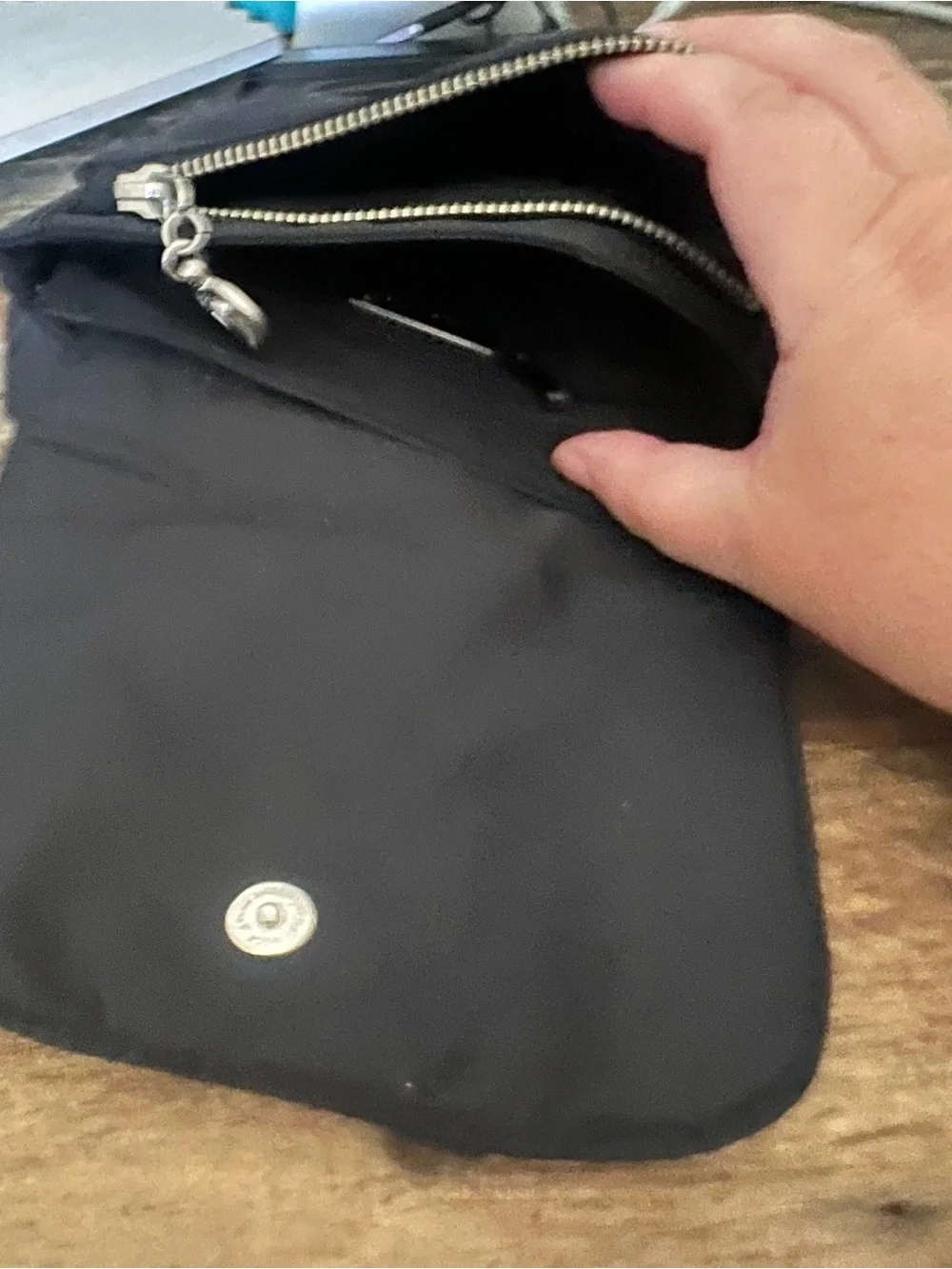 Black Crossbody Shoulder Bag with Winged Emblem by Nicole Miller